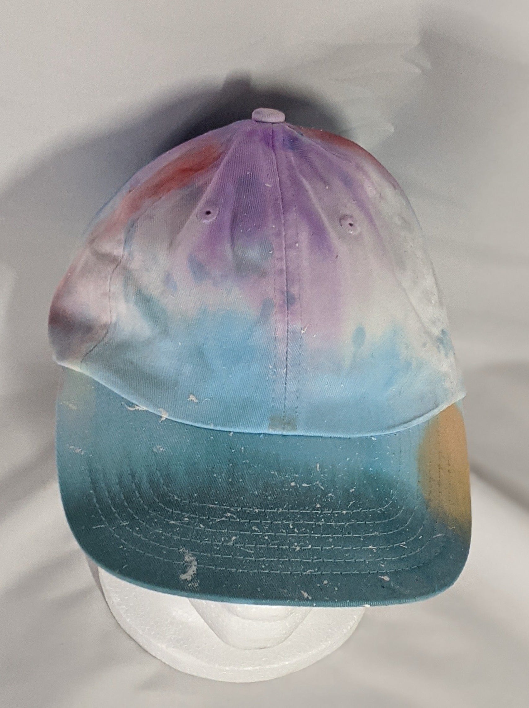 Add a splash of color to your wardrobe and your adventures. A fun nod to space, this abstract and tie-dye inspired updated take on the classic dad hat offers plenty of shade and loads of comfort no matter where you roam.