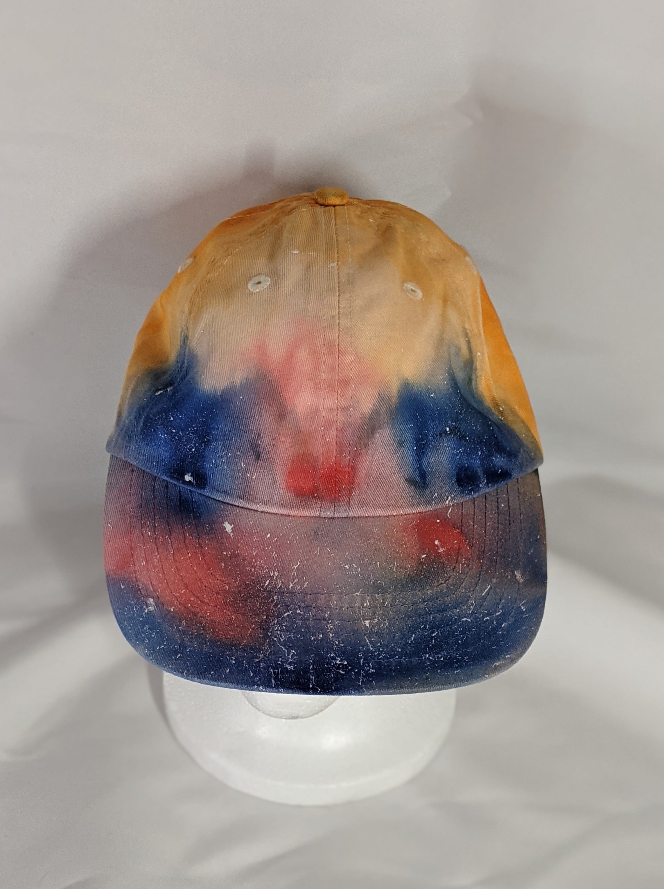 Add a splash of color to your wardrobe and your adventures. A fun nod to space, this abstract and tie-dye inspired updated take on the classic dad hat offers plenty of shade and loads of comfort no matter where you roam.
