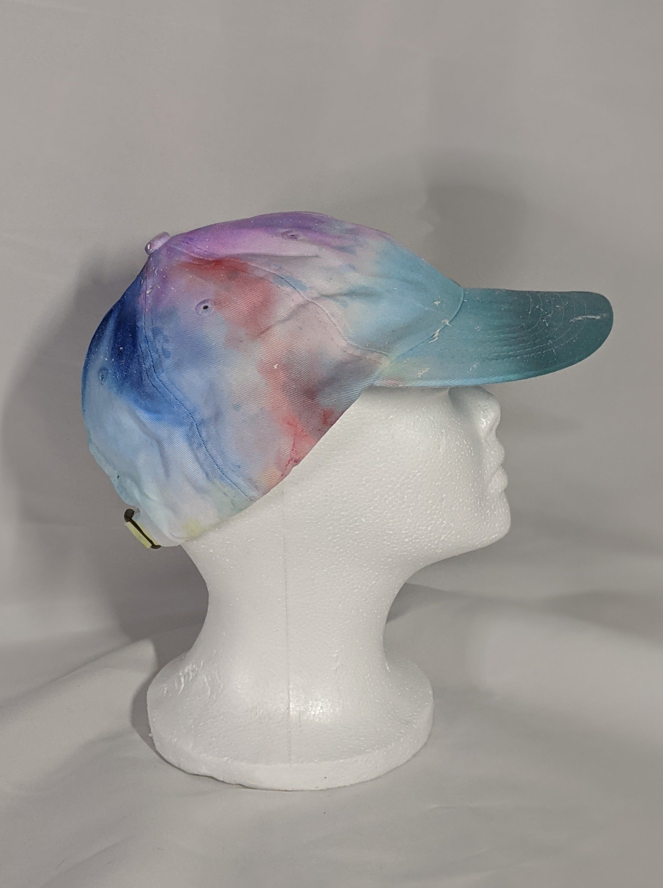 Add a splash of color to your wardrobe and your adventures. A fun nod to space, this abstract and tie-dye inspired updated take on the classic dad hat offers plenty of shade and loads of comfort no matter where you roam.