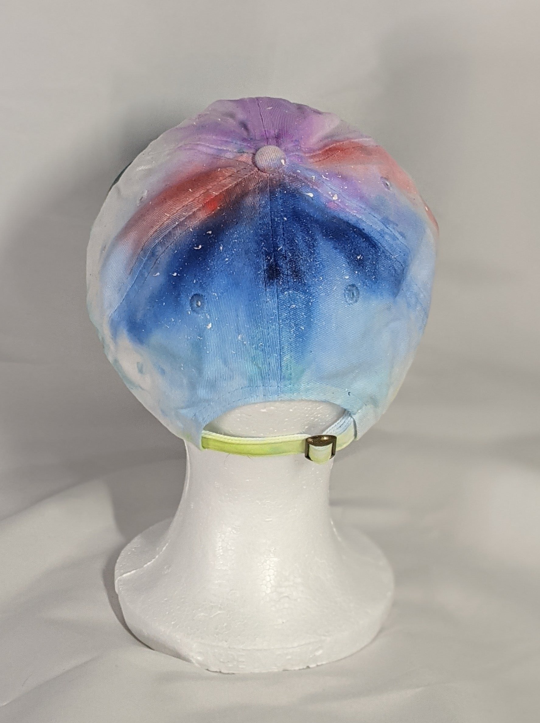 Add a splash of color to your wardrobe and your adventures. A fun nod to space, this abstract and tie-dye inspired updated take on the classic dad hat offers plenty of shade and loads of comfort no matter where you roam.