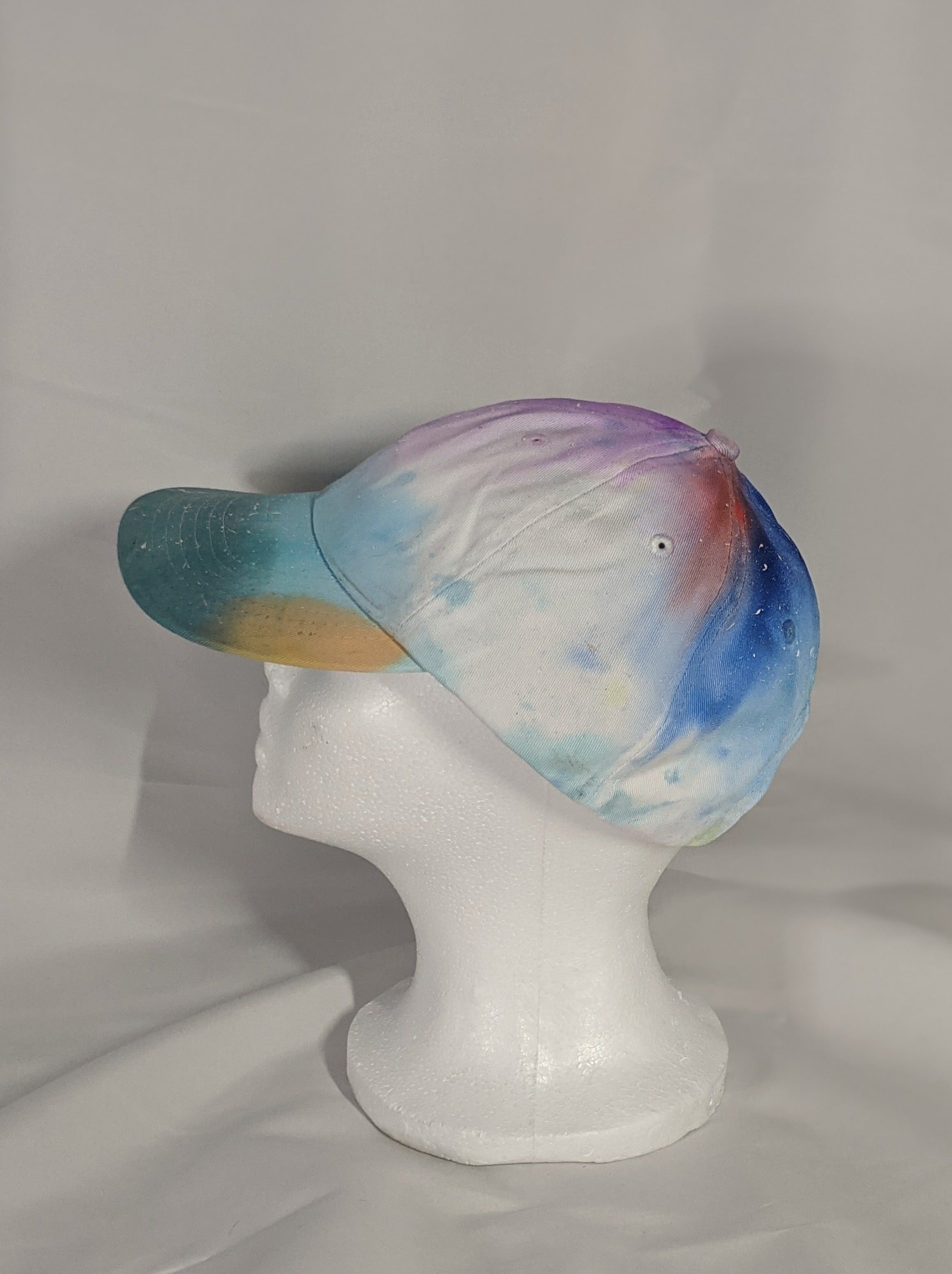 Add a splash of color to your wardrobe and your adventures. A fun nod to space, this abstract and tie-dye inspired updated take on the classic dad hat offers plenty of shade and loads of comfort no matter where you roam.