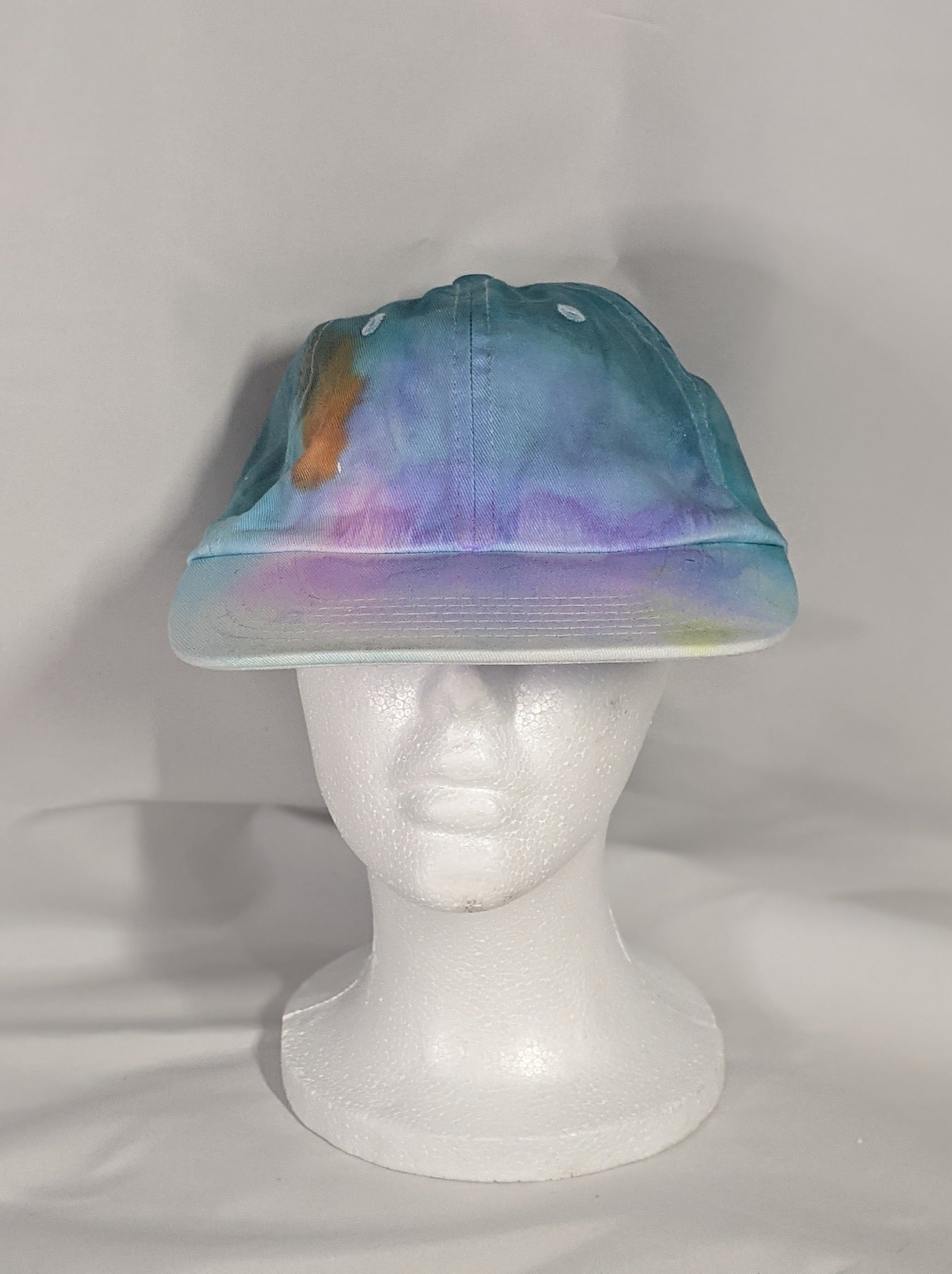 Add a splash of color to your wardrobe and your adventures. A fun nod to space, this abstract and tie-dye inspired updated take on the classic dad hat offers plenty of shade and loads of comfort no matter where you roam.