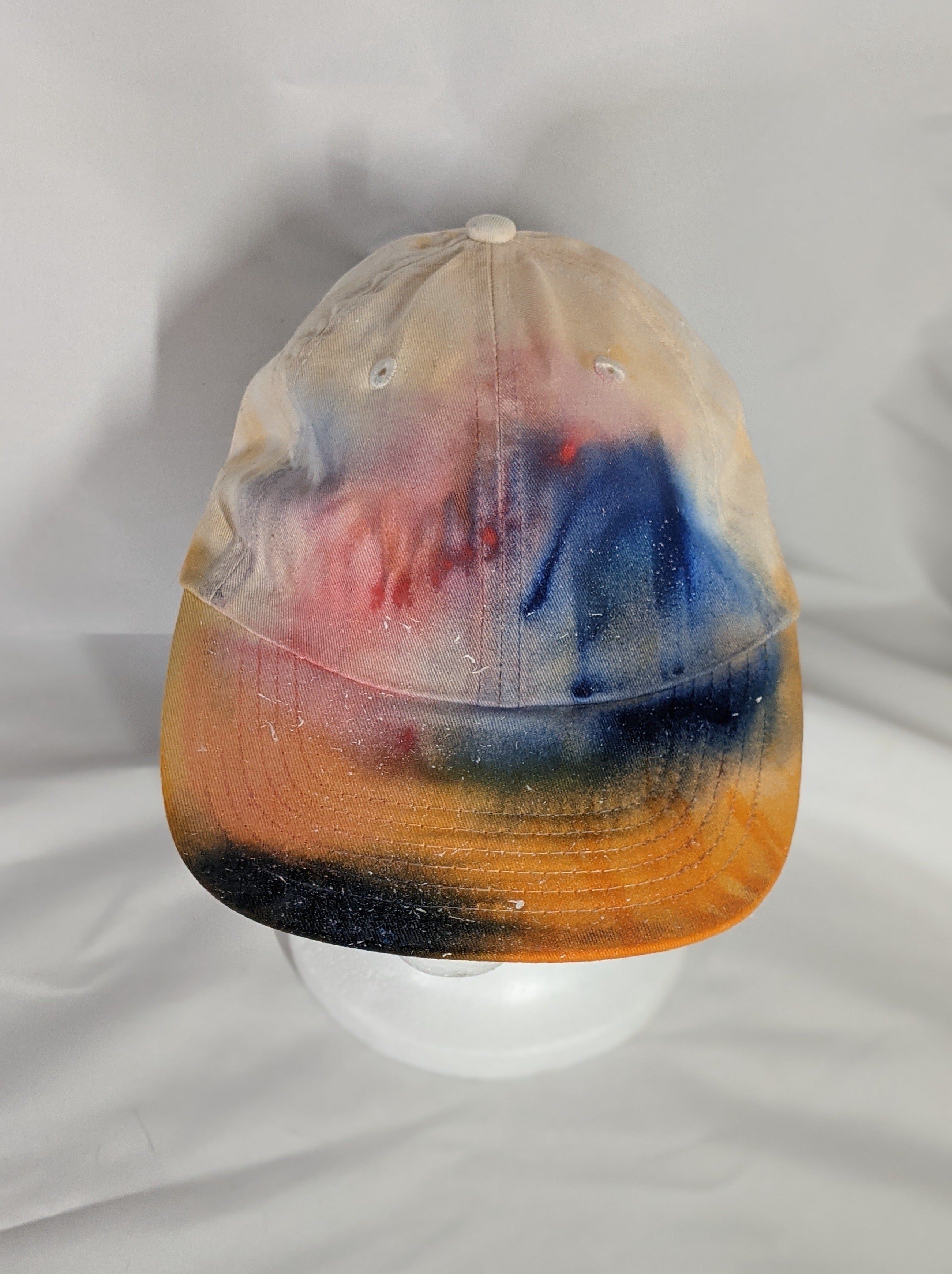 Add a splash of color to your wardrobe and your adventures. A fun nod to space, this abstract and tie-dye inspired updated take on the classic dad hat offers plenty of shade and loads of comfort no matter where you roam.