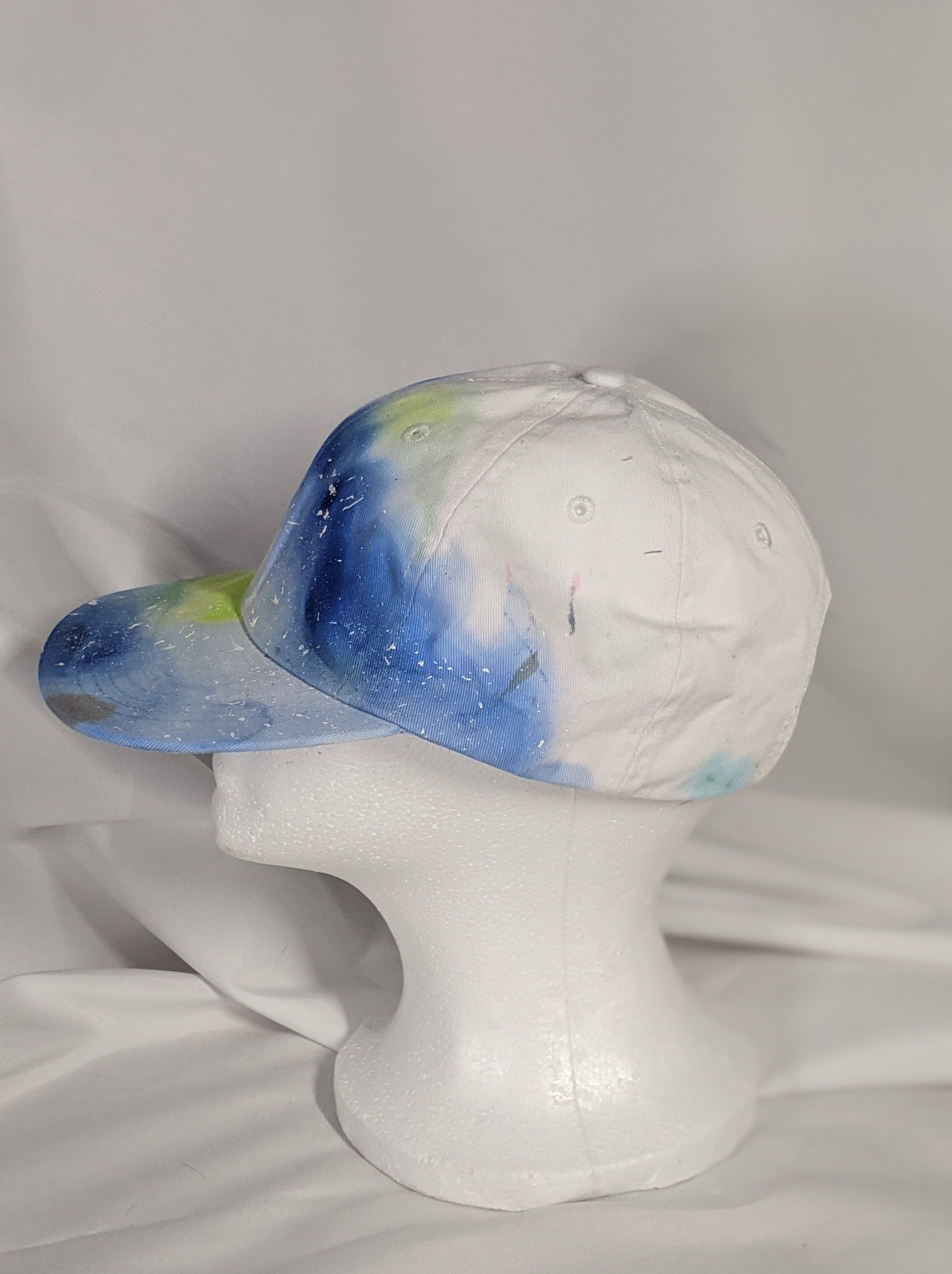 Add a splash of color to your wardrobe and your adventures. A fun nod to space, this abstract and tie-dye inspired updated take on the classic dad hat offers plenty of shade and loads of comfort no matter where you roam.